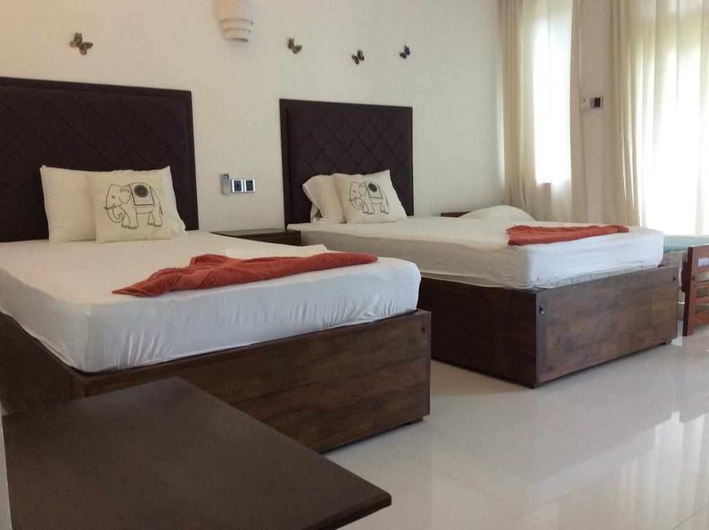 Lemazone Inn Mirissa Quarto foto